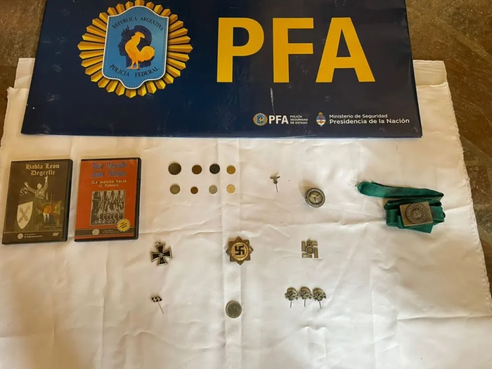 Villa de Merlo: Durante un allanamiento para buscar dióxido de cloro encontraron simbología nazi